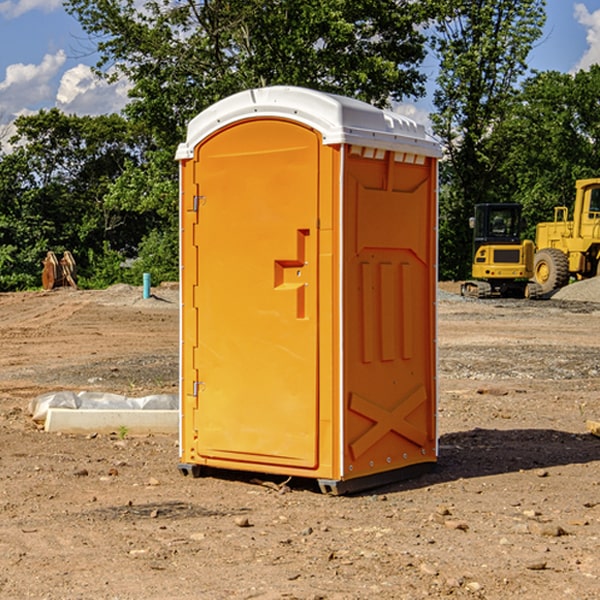 how often are the portable restrooms cleaned and serviced during a rental period in Baldwin